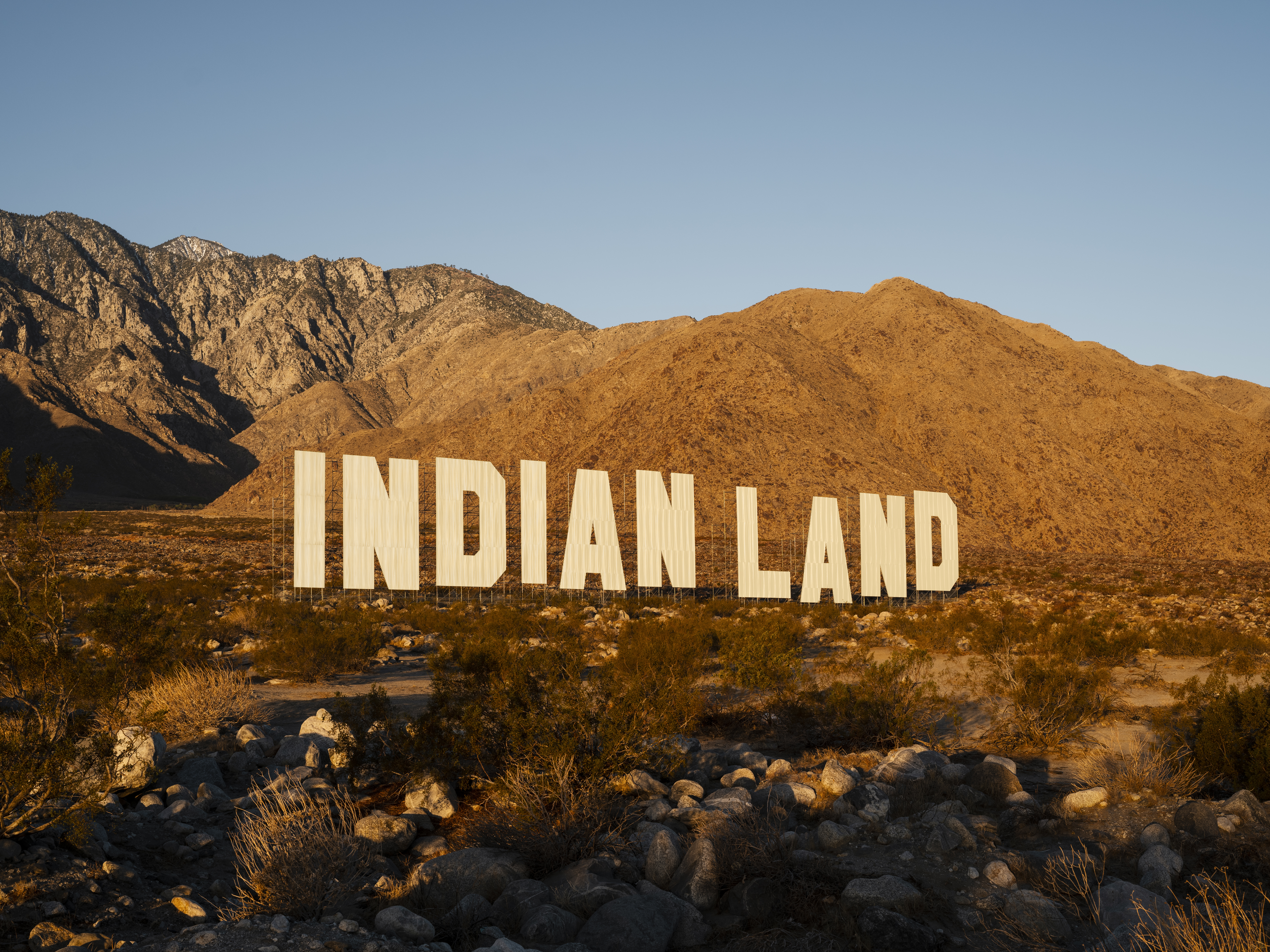 Hollywood Sign-Like Artwork Asks Difficult Land Rights Questions - Vimarsana News